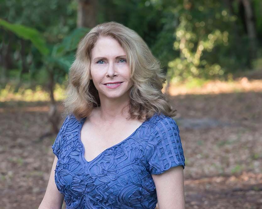 Page 58 - Ginny worthington new headshot.jpg